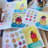 Paintings of cupcakes completed by the youth group