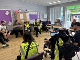 The group discussing their project
